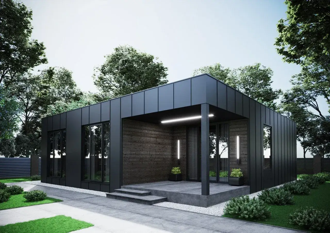 Nowoczesny dom z kontenerów 100m2. Cena przystępna. Elegancka czarna elewacja, drewniane akcenty, duże okna.